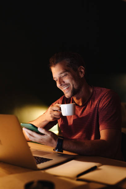 istock Happy Businessman Working at Home at Night 1363227337