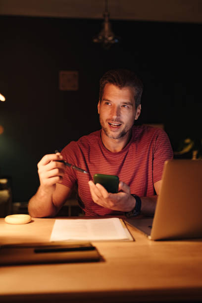 istock Happy Businessman Working at Home at Night 1363227338