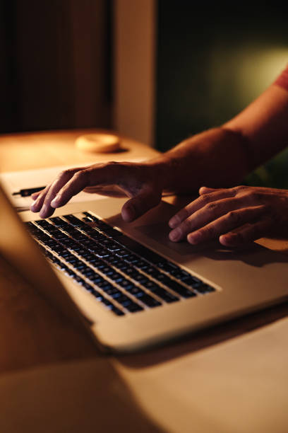 istock An Anonymous Businessman Working at Home at Night 1363227347