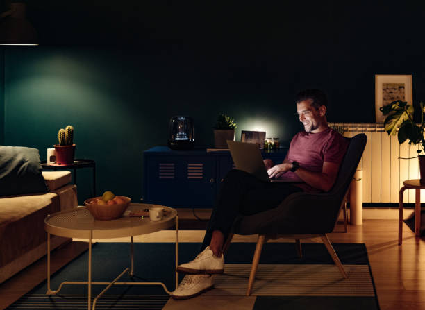 istock Happy Businessman Working at Home at Night 1363227359