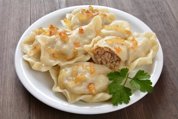 dumplings dumplings with cabbage and meat pierogi stock pictures, royalty-free photos & images