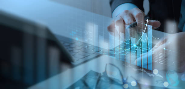 istock Businessman working with modern computer calculator virtual dashboard analyzing finance sales data and economic growth graph chart. 1363233231