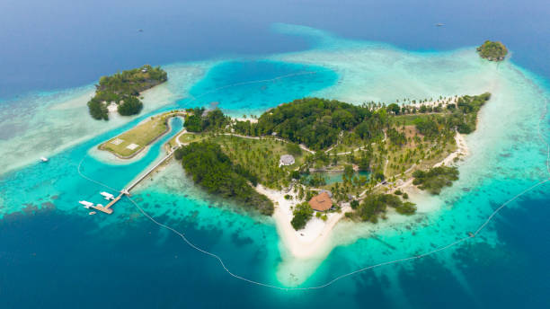istock Tropical island with beach. Malipano island, Philippines, Samal 1363234255