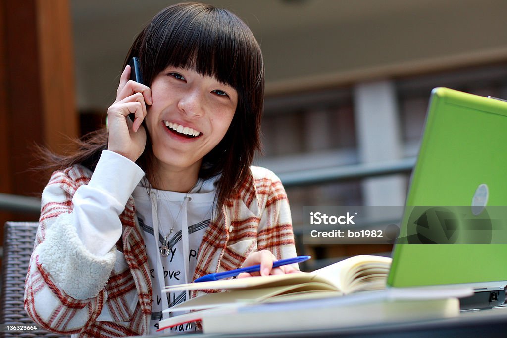 nice conversation she is so happy to talking to her friend 18-19 Years Stock Photo