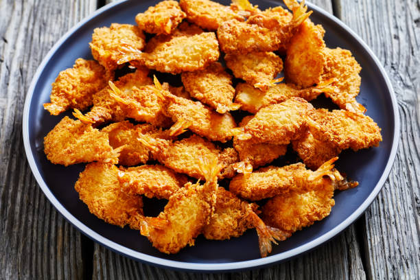 istock Crispy Fried Butterfly Shrimp on a grey plate 1363240296