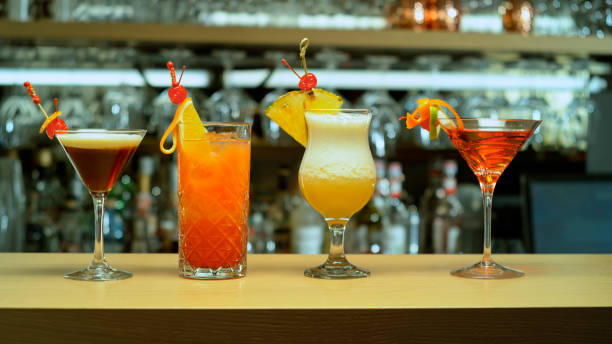 https://media.istockphoto.com/id/1363246566/photo/variety-of-cocktails-into-glass-set-on-the-bar-counter.jpg?s=612x612&w=0&k=20&c=7C_de1iG2k7r6lWkWgP6HT8CKzIdoVBYJ98OcTLquts=