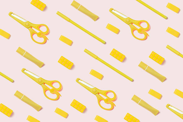 Pattern of Yellow highlighter, pens and stationary on pink Background