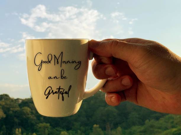 istock Good morning and grateful text on coffee cup. Morning concept 1363247350