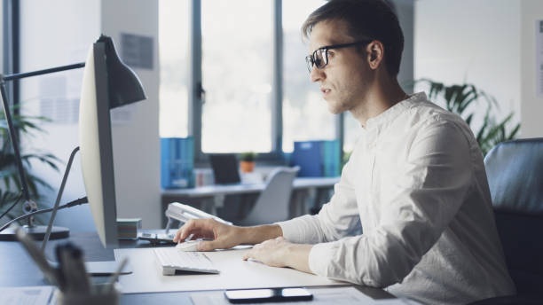 istock Corporate businessman working in the office 1363248890