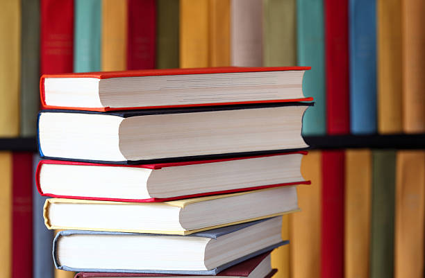 istock Stacked books and bookshelves 136325011