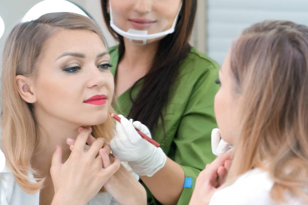 istock Lip tattoo in a beauty salon. 1363254339