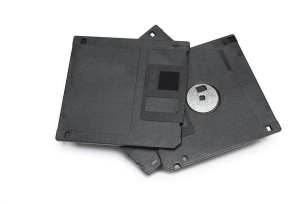 istock Closeup floppy disks stacked white background 1363259555
