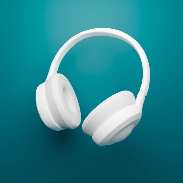 istock 3D Rendering white headphones on turquoise background. 1363260512