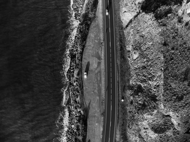 istock Road along the sea BW 1363261691