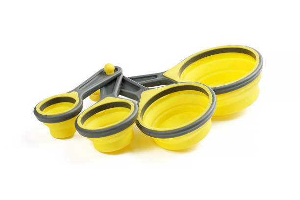 istock Set of silicone yellow measuring cups and measuring spoons, kitchenware for cooking 1363264881