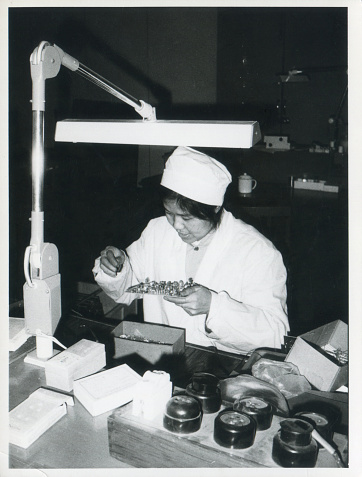 1980s Chinese Female Technician in Laboratory Monochrome Old Photo