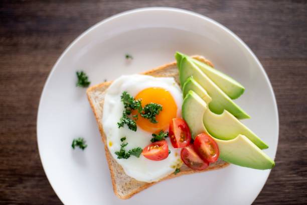 istock Egg, tomato, and avocado on the toast 1363270843