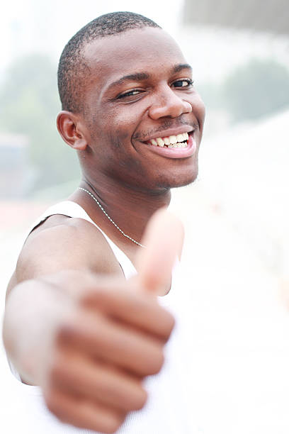 istock happy young african man looking at camera 136327104