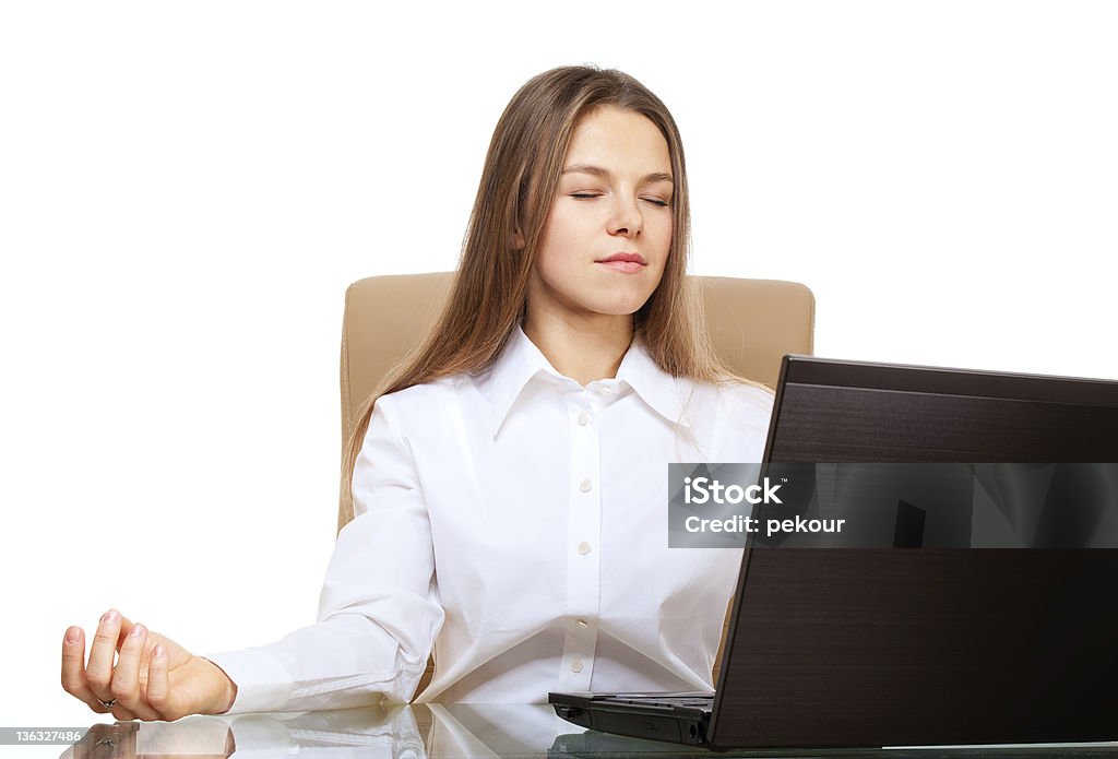 Woman meditation in the office workplace Woman meditation in the office workplace isolated on white Adult Stock Photo