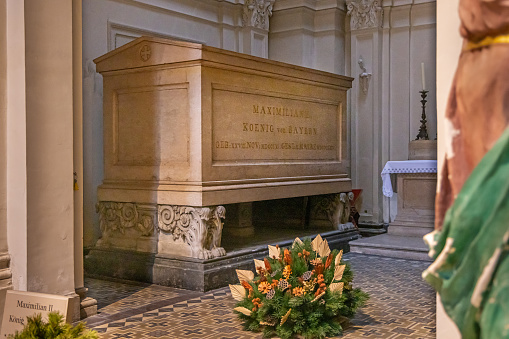 Sarcophagus with the remains of King Maximillian II in a side chapel in the Theatine Church Theatinerkirche from 1690 which is built in an Italian High-Baroque style. It is one of the many churches in the German city Munich (the capital city in Bavaria) which has been damaged during Second World War but has been rebuild afterwards.