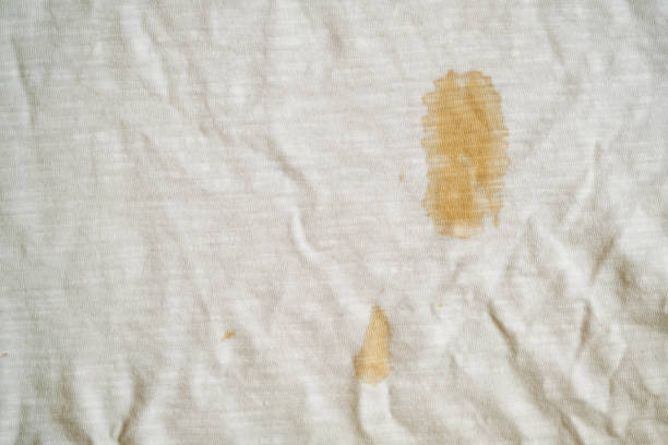istock white fabric with coffee stain and wrinkles 1363277643