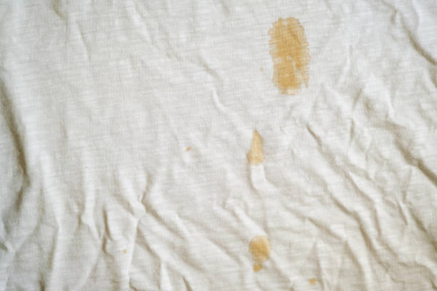 istock white fabric with coffee stain and wrinkles 1363277649