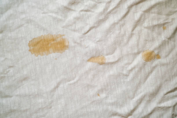 istock white fabric with coffee stain and wrinkles 1363277650