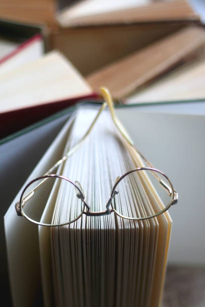 istock Hardcover Books and Reading Glasses 1363283936