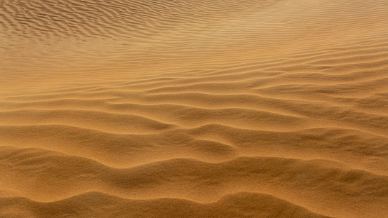 Beautiful patterns created on the sand dunes by the wind. Lovely desert landscapes.