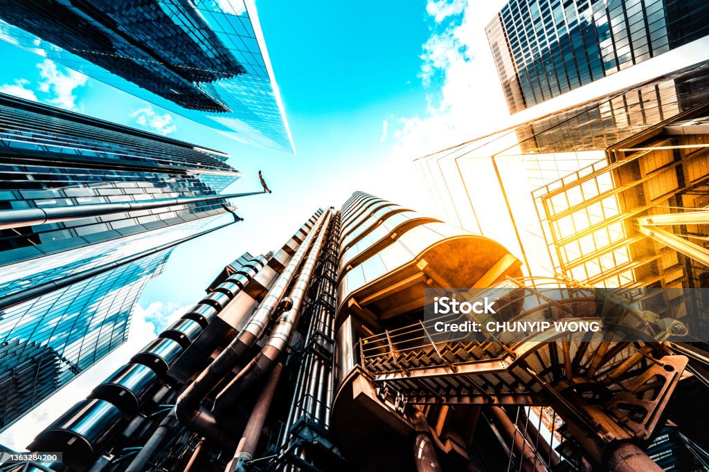 View of high rise glass building and dark steel in London Lloyds of London Stock Photo