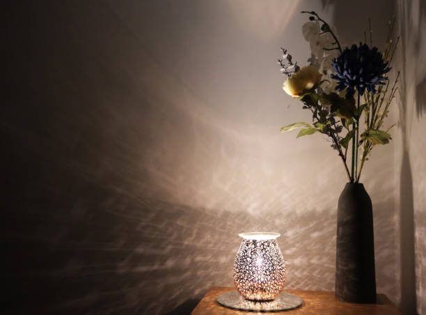 istock Flower vase in light shadow. Atmospheric, moody, modern interior design still life.design 1363286822
