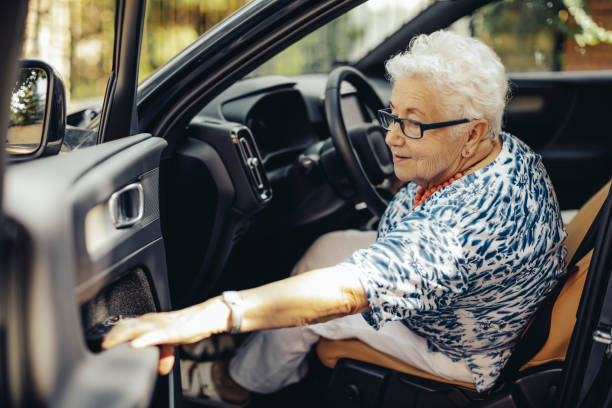 istock Senior woman in the car 1363289025