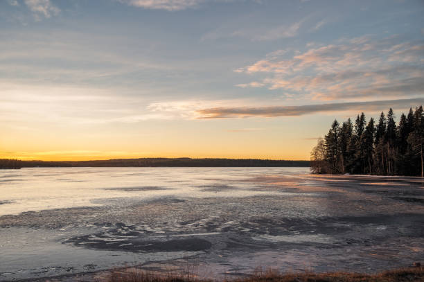istock Scandinavian sunset over a frozen lake 1363289063