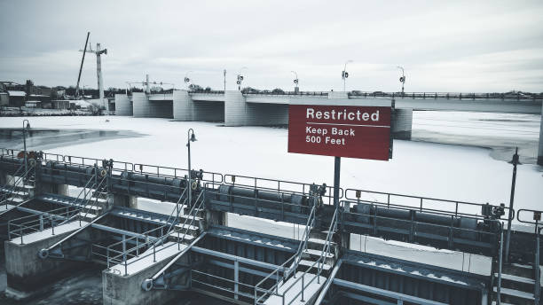 istock Graphite themed view of closed reservoir with warning sign. 1363289088