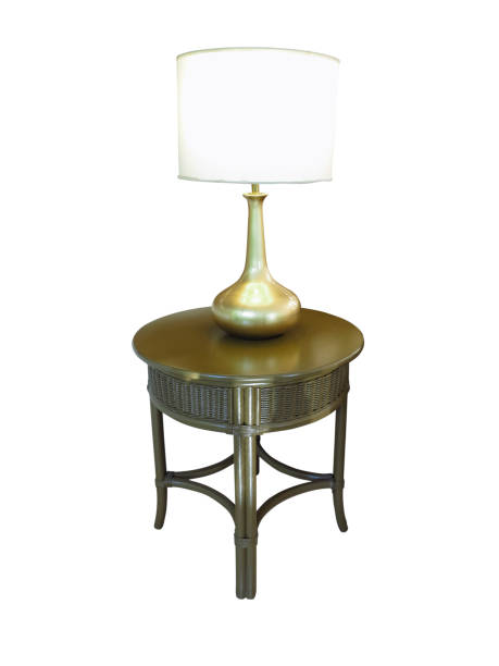 istock stylish table with  golden lamp isolated over white 1363291388