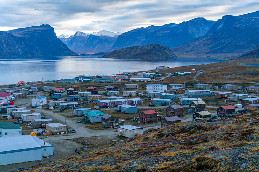 Pangnirtung, Canada - 09.03.2019: View of a remote Inuit community of Pangnirtung, Nunavut, Canada. Early morning before sunrise in Pangnirtung fjord. The north.