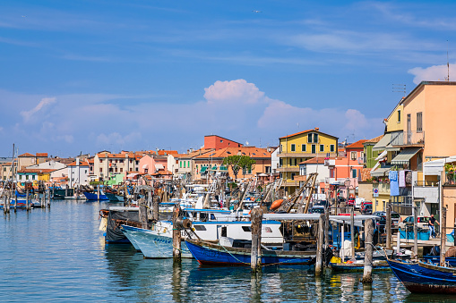 Fishing boats moored at the harbour of Sottomarina, a small town and a frazione of Chioggia, which is part of the Metropolitan City of Venice.