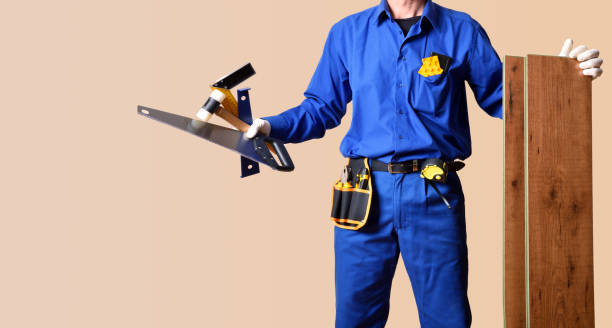 istock Body parquet installer in overalls with tools and material background 1363295791