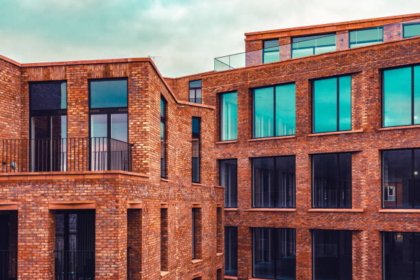 modern residential building - construction apartment house in a row imagens e fotografias de stock