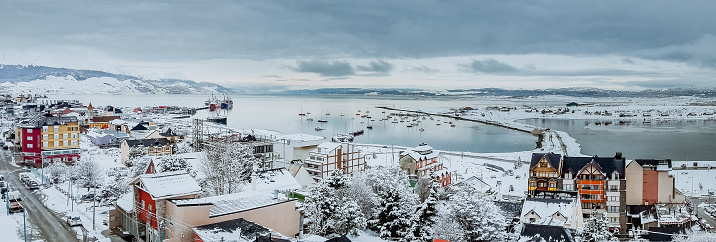View of the city of Ushuaia in winter season and the Beagle Channel in the background, Patagonia