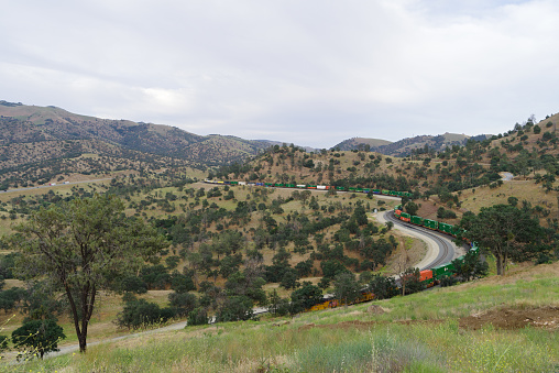 Tehachapi Pass, California, USA : image showing a BNSF train moving through the Tehachapi Pass in Kern County.