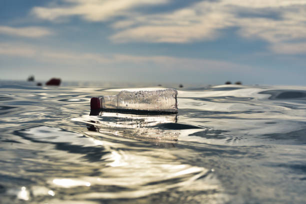 istock Plastic waste floating in the ocean 1363302217