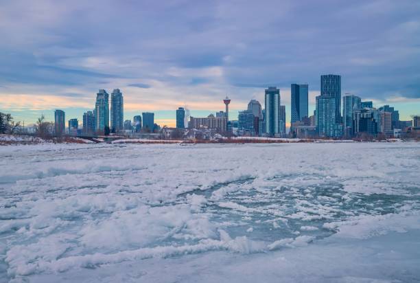 istock Clouds Over A Frozen Calgary River Valley 1363303716