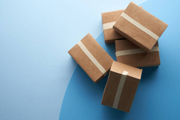 istock top view of cardboard box on blue background 1363304147