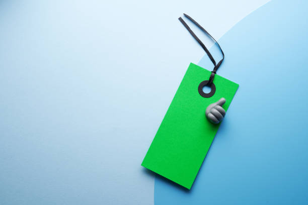 green price tag with small thumb's up