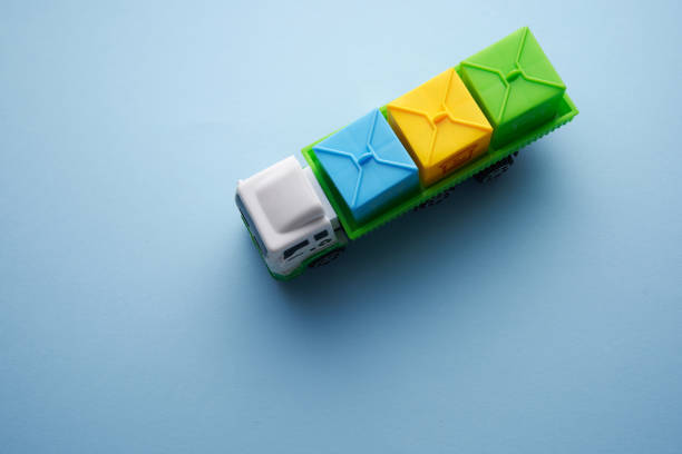 high angle view of recycle garbage truck against blue background