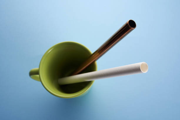 istock Modern reusable steel and paper drinking straws as alternative replacement for plastic drinking straw. 1363304971