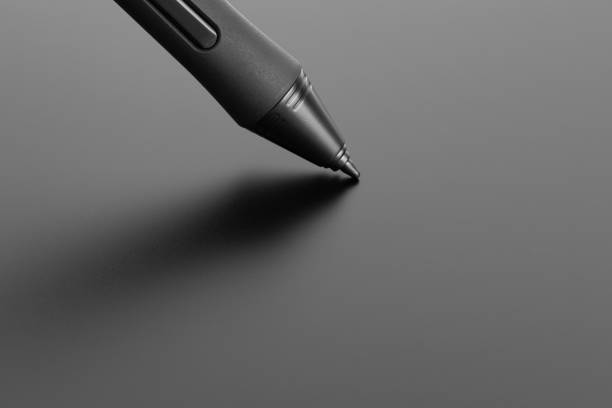 istock Pen for a graphics tablet on a white background. Electronic pen for close-up retouching. 1363306739