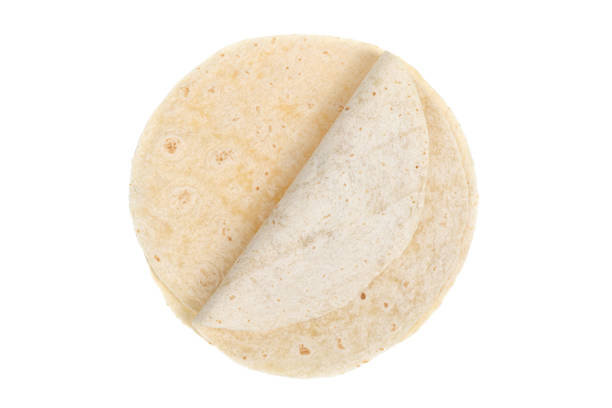 istock Tortilla on a white background. Thin flatbread close-up on a white background. 1363307642