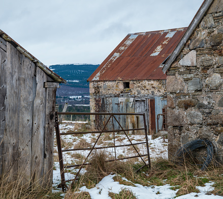 This is a scene of a long disused Farm and its house within the Caingorms Region of Aviemore, Scotland on 6 January 2022.